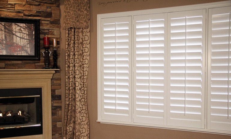 Southern California Studio plantation shutters in family room.